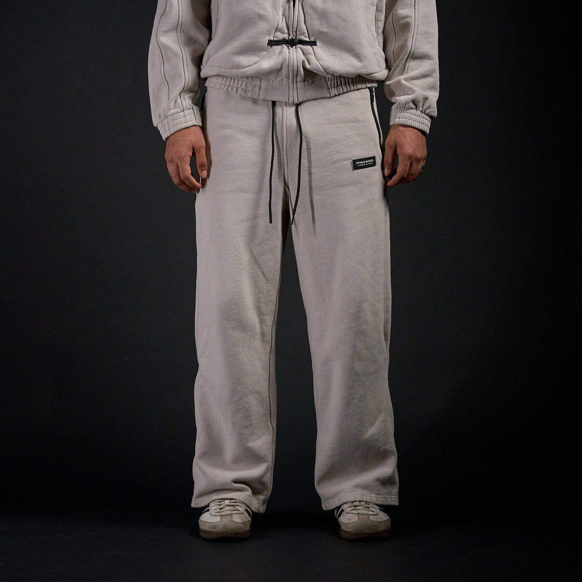Warmup Pants in TWILIGHT bone, front view on model | Village Hidden in Iron