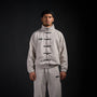 Tang Warmup Jacket in TWILIGHT bone, front view on model | Village Hidden in Iron
