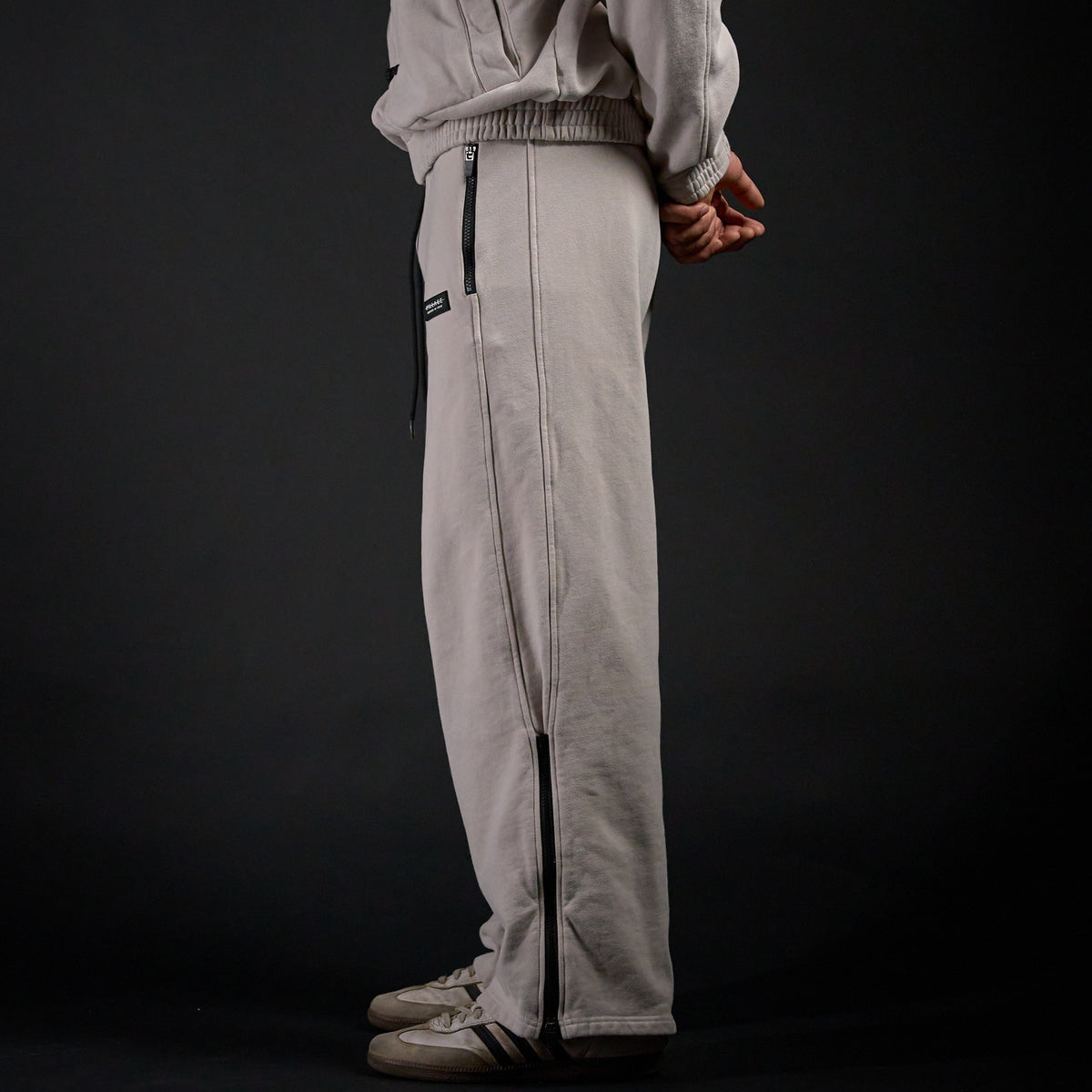 Warmup Pants in TWILIGHT bone, side view on model | Village Hidden in Iron