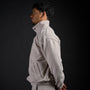 Tang Warmup Jacket in TWILIGHT bone, side profile on model | Village Hidden in Iron