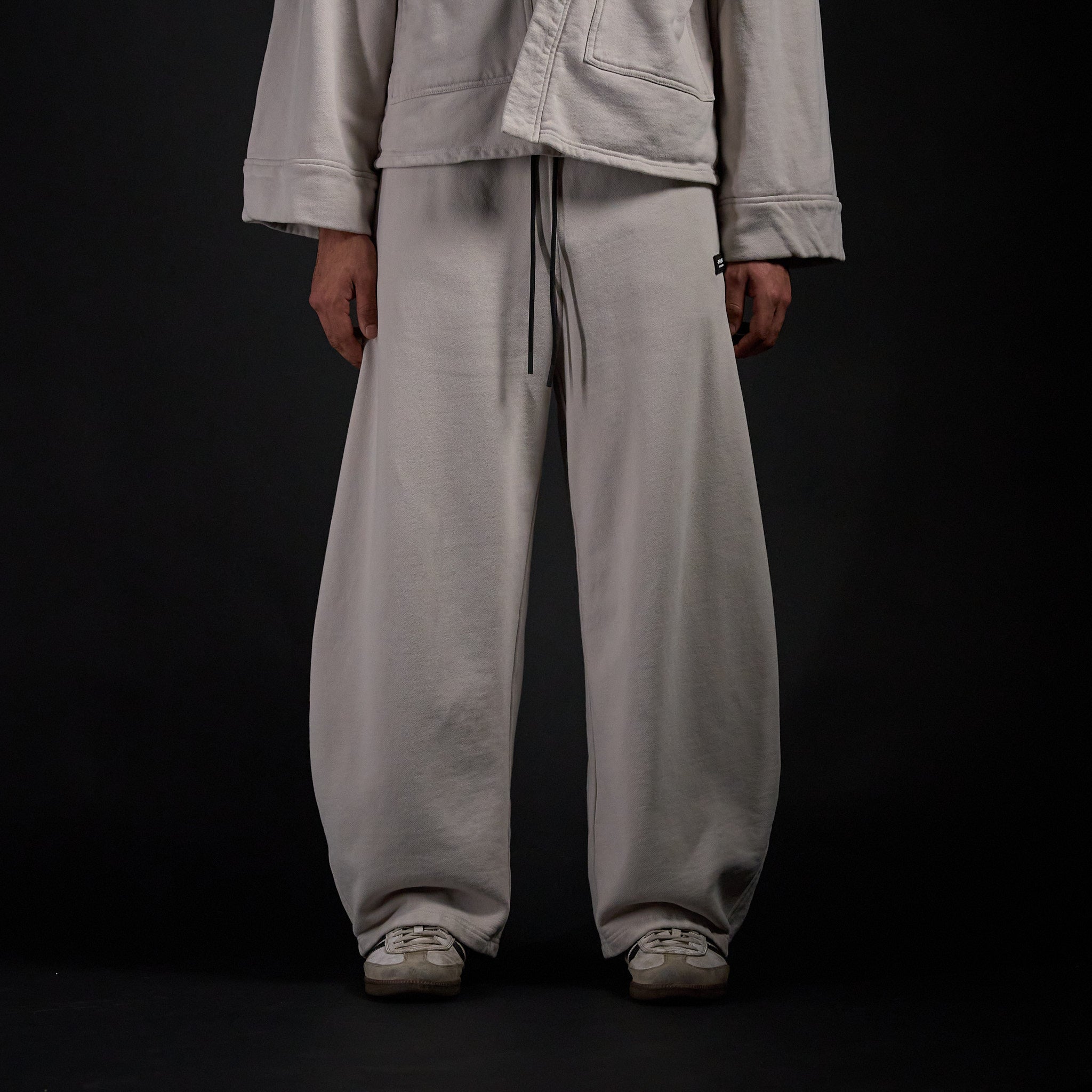 Hakama Sweatpants in TWILIGHT bone, front view on model | Village Hidden in Iron