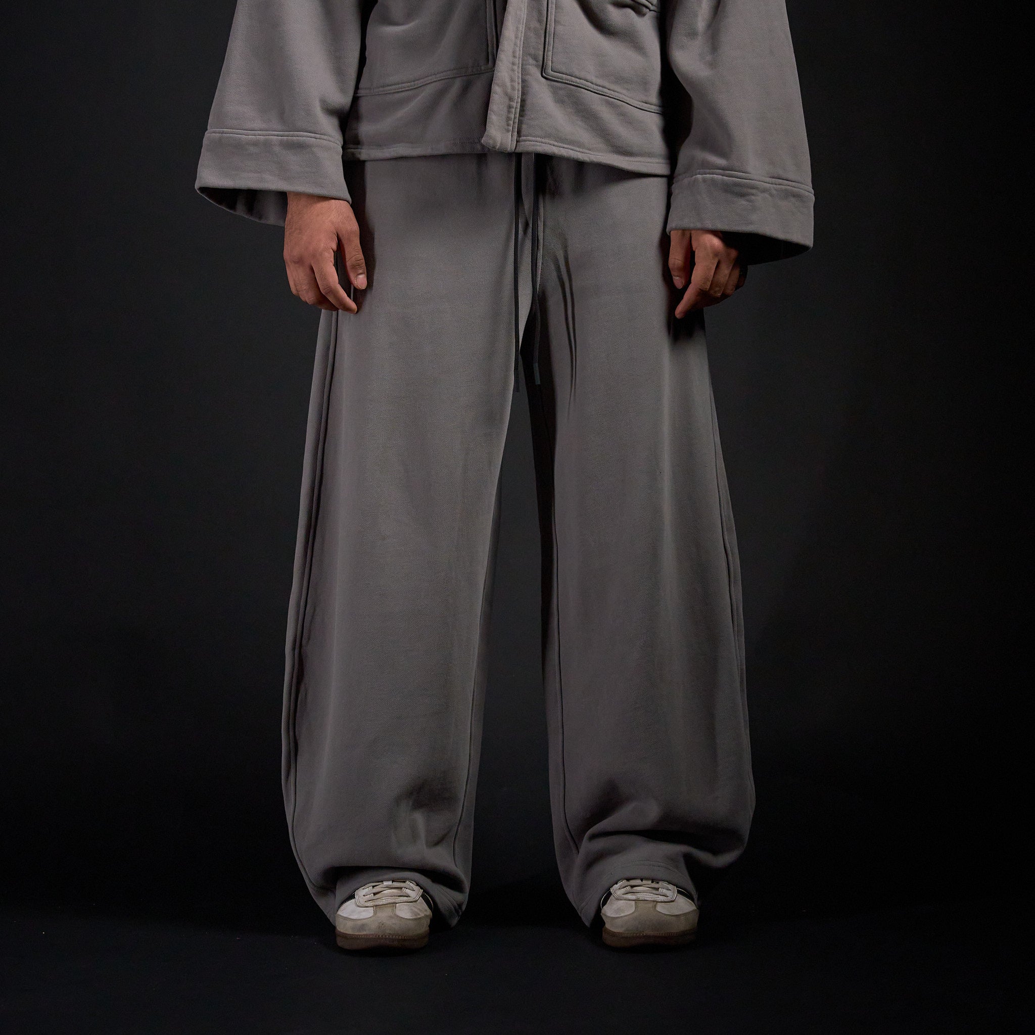 Hakama Sweatpants in DARKSIDE charcoal grey, front view on model | Village Hidden in Iron