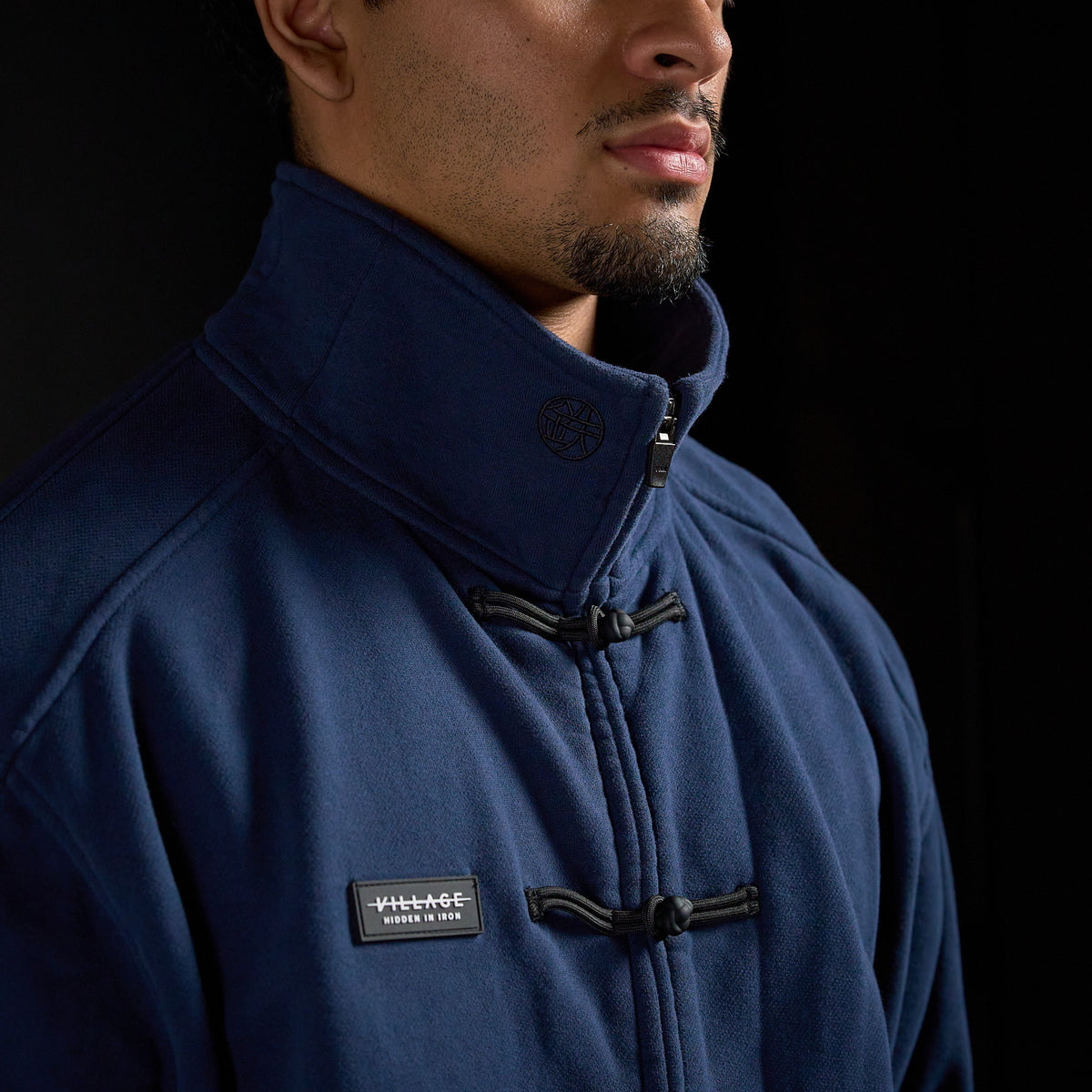 Tang Warmup Jacket in MIDNIGHT navy, close-up of stand collar | Village Hidden in Iron