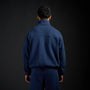 Tang Warmup Jacket in MIDNIGHT navy, back view on model | Village Hidden in Iron