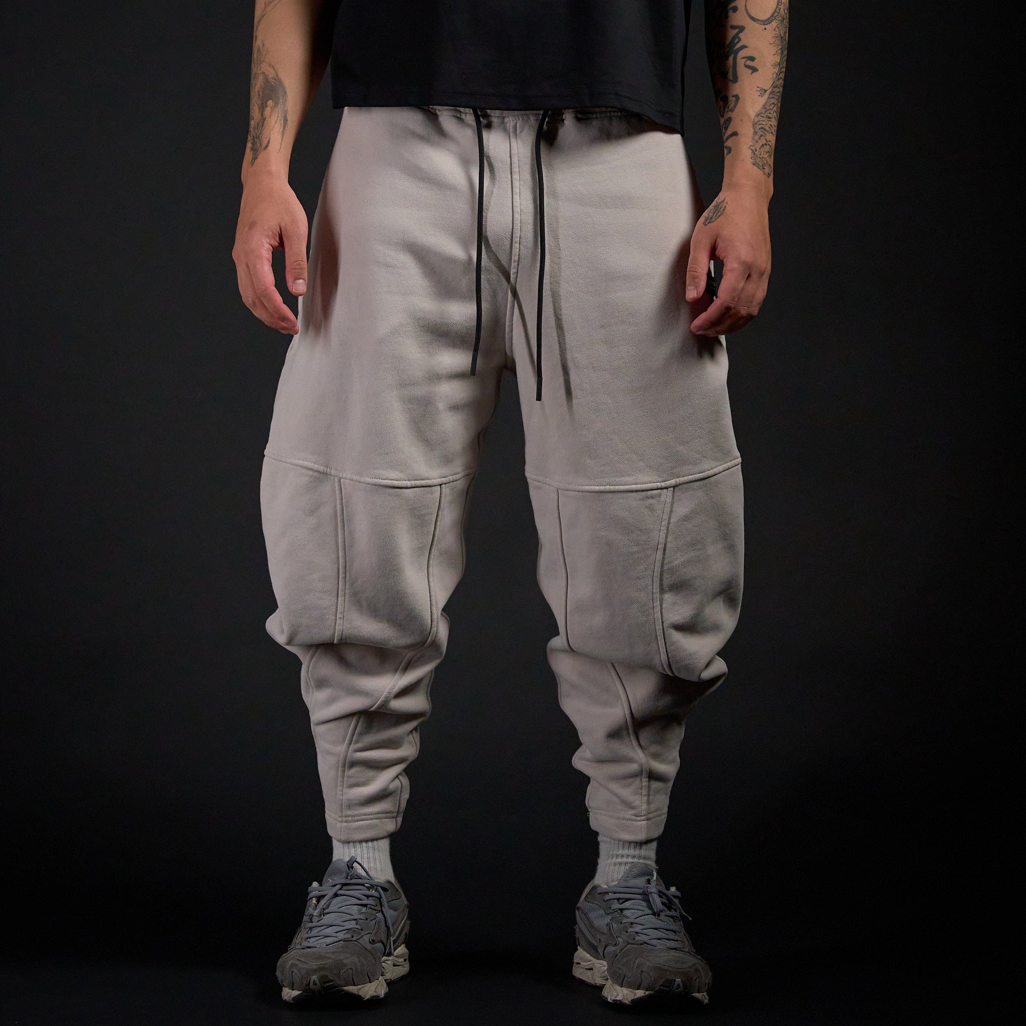 Tobi Sweatpants in TWILIGHT bone, front view on model | Village Hidden in Iron