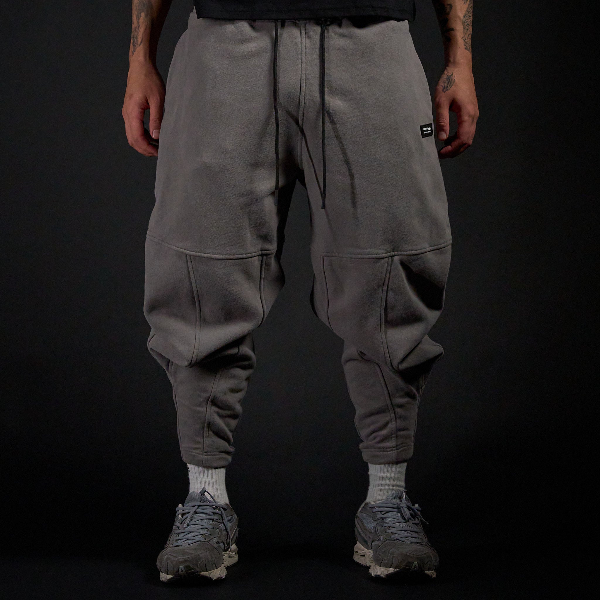 Tobi Sweatpants in DARKSIDE charcoal grey, front view on model | Village Hidden in Iron