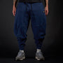 Tobi Sweatpants in MIDNIGHT navy, front view on model | Village Hidden in Iron