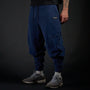 Tobi Sweatpants in MIDNIGHT navy, three-quarter view on model | Village Hidden in Iron